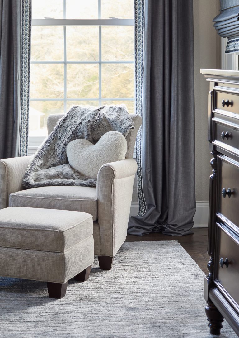 Cozy Chair And Ottoman Near Window